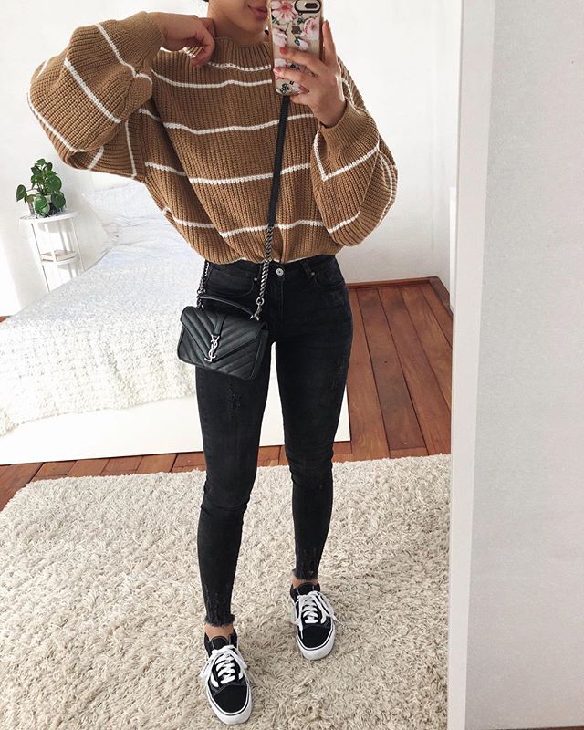 tenue avec un jean noir femme