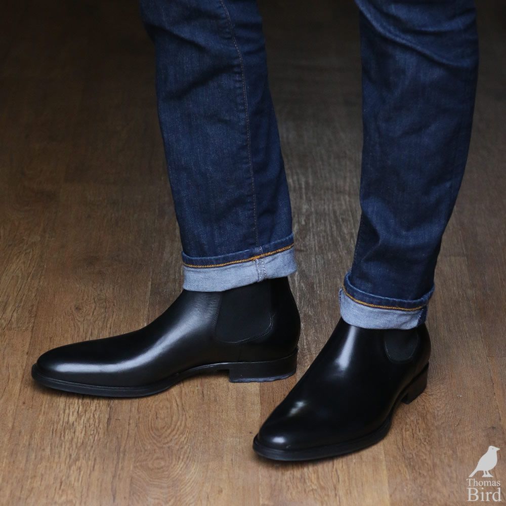 black chelsea boots and jeans