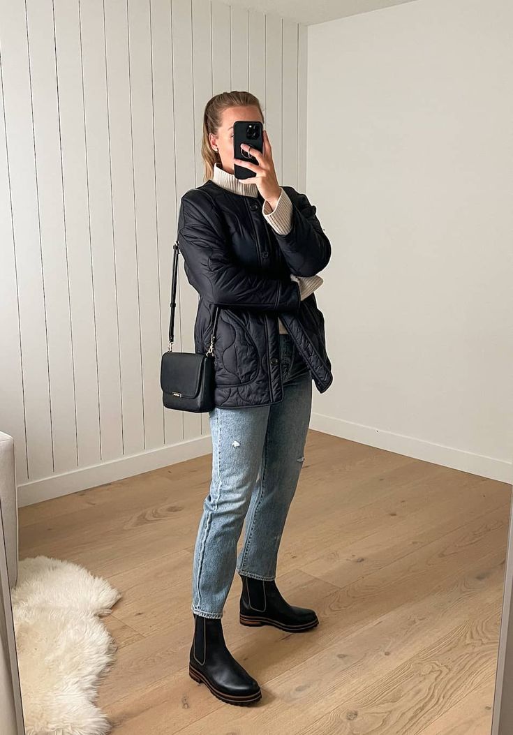 black chelsea boots and jeans