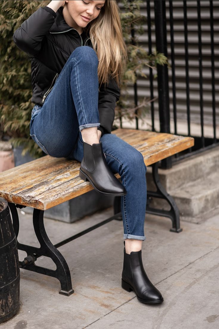 black chelsea boots and jeans